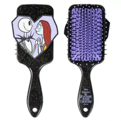 Brosse à cheveux L'étrange...